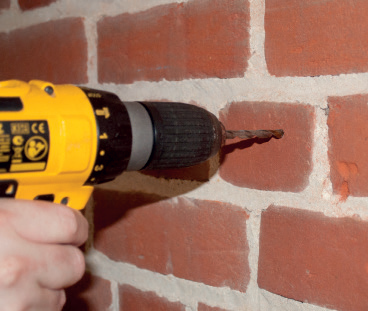 Drilling the mounting bracket screw hole