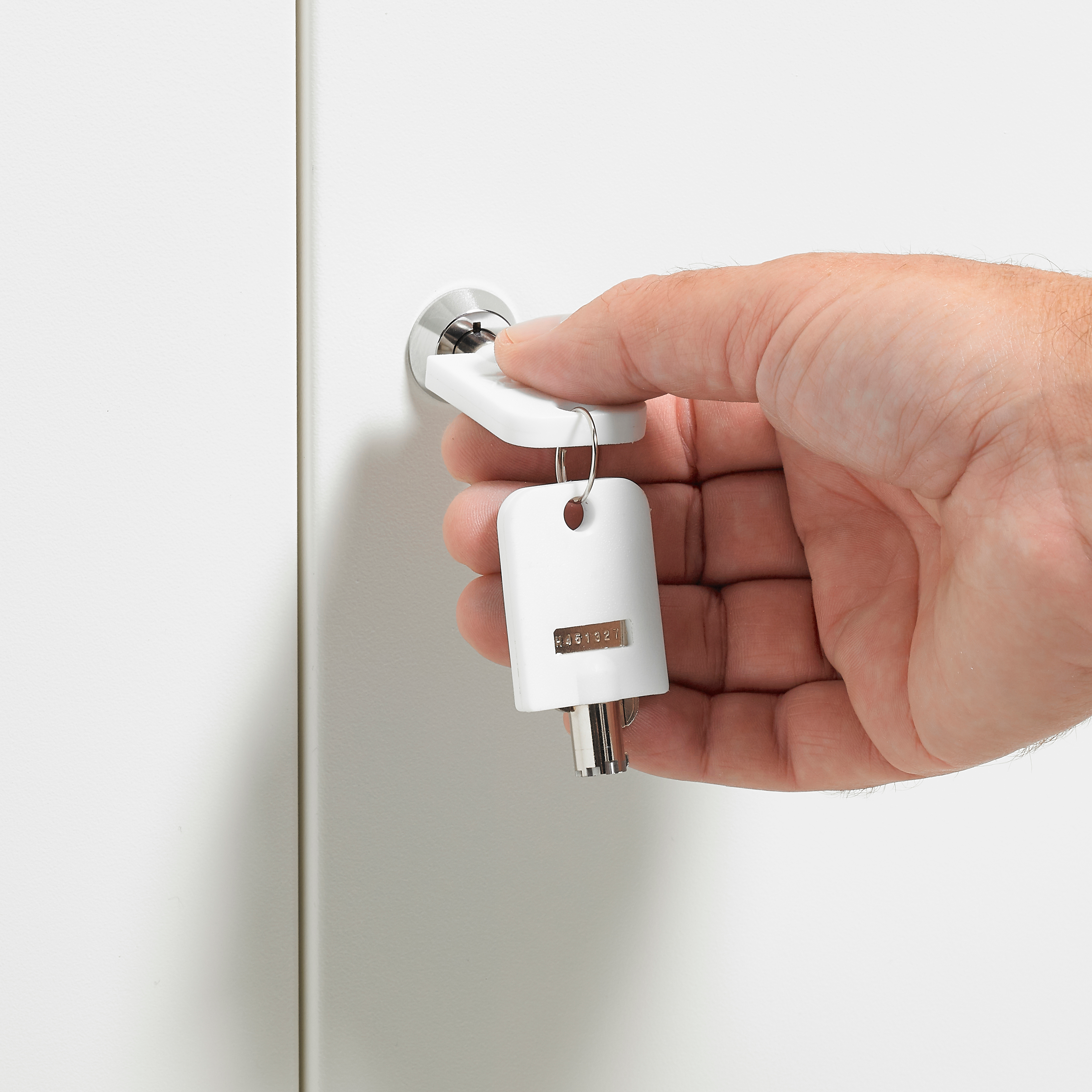 User opening key lock on ChargeLite Door