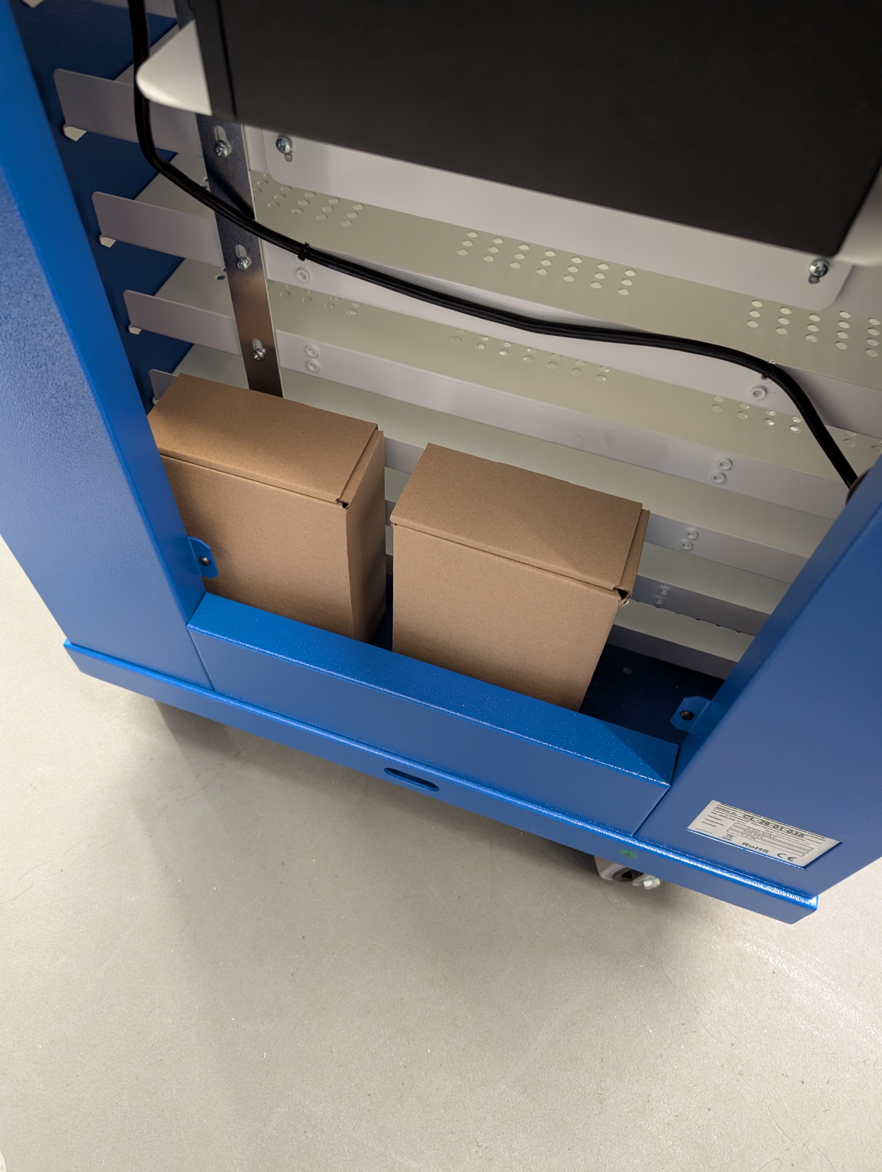 Charging lead boxes in rear service area of trolley