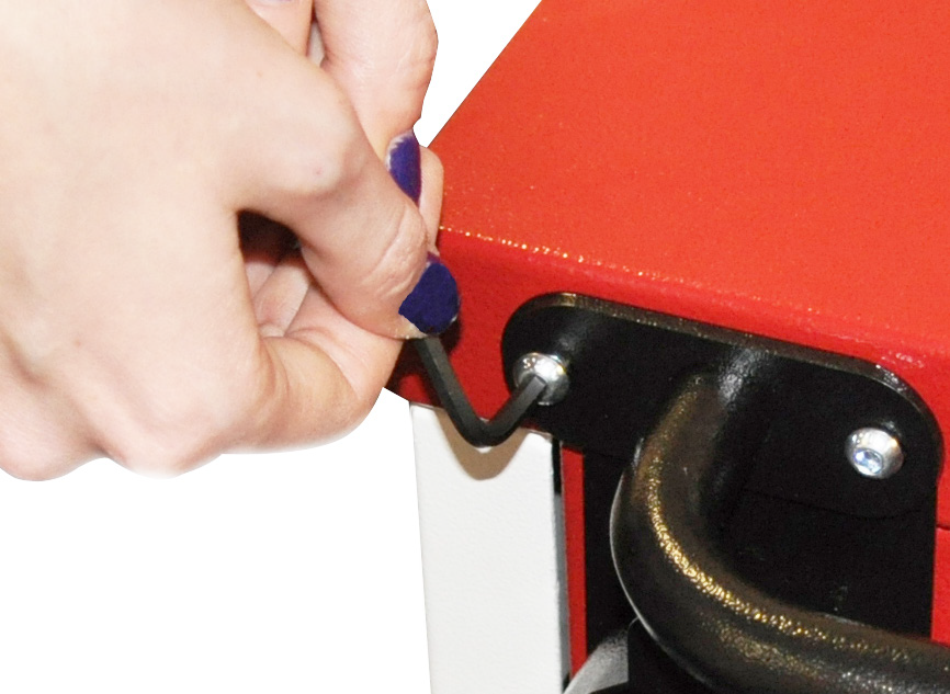 User installing trolley handles to the top of a Mentor trolley