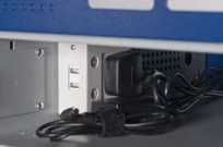 Internal view of a locker bay with a ChargeLine ULTRA™ plug visible on the left side surface